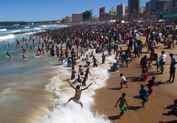 People visit the beach on New Year's Day in Durban, South Africa, on January 1, 2014. REUTERS/Rogan Ward People visit the beach on New Year's Day in Durban, South Africa, on January 1, 2014.